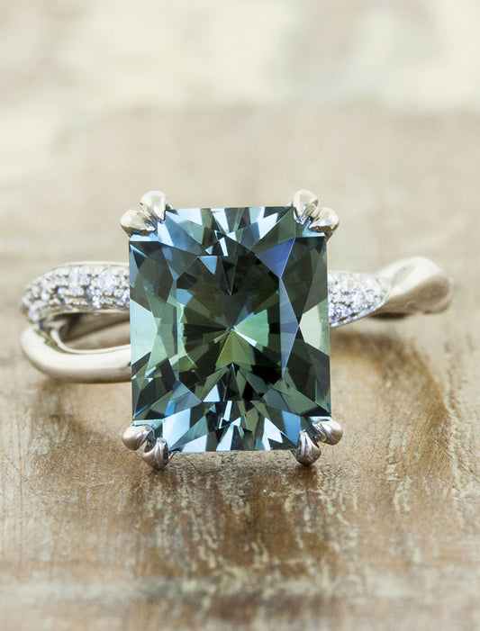 caption:Shown with 5.64ct radiant cut sapphire in platinum