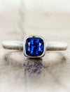 caption:Customized with cushion cut blue sapphire in platinum