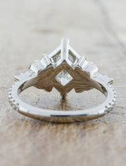 caption:Princess Cut Diamond Ring with round diamond accents