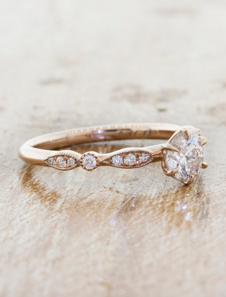 round diamond in a vintage-inspired, encrusted diamond band