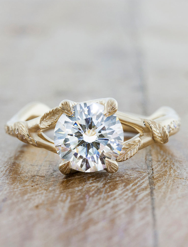 caption:Shown with 1.5ct round diamond in 14k yellow gold