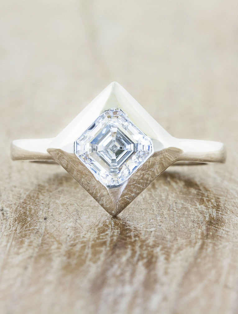 caption:Shown with 0.7ct asscher cut diamond in platinum