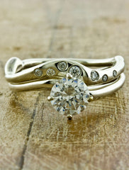 Handmade Organic Wedding Bands by Ken & Dana Design - Sati & Aurora pairing. caption:Shown with Aurora engagement ring