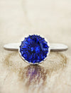caption:Shown with blue sapphire in platinum
