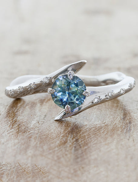 unique asymmetrical engagement ring;caption:0.70ct. Round Sapphire 14k White Gold