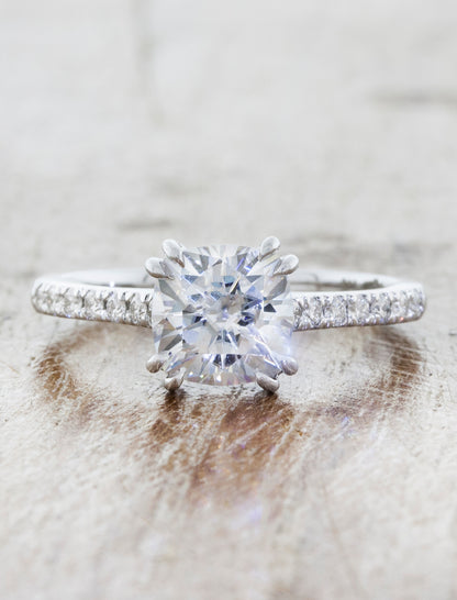Solitaire with pave diamond band double prongs;caption: 1.25ct. Cushion Cut Diamond 14k White Gold