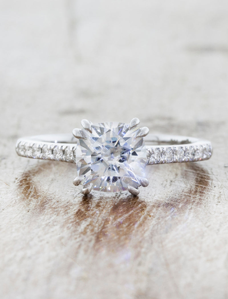 caption:Shown with 1.25ct cushion cut diamond in 14k white gold