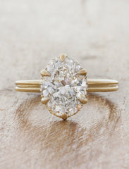 Nature inspired solitaire double band;caption:2.25ct. Oval Diamond 14k Yellow Gold