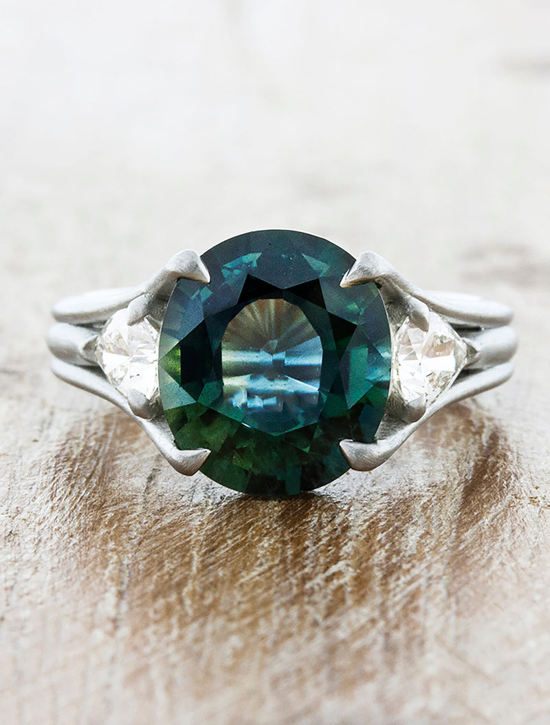 caption:Shown with oval sapphire in platinum