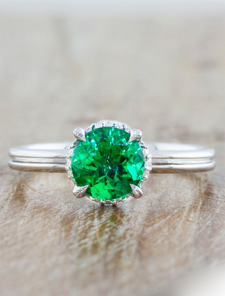 Nature inspired solitaire double band;caption:1.00ct. Round Emerald Platinum