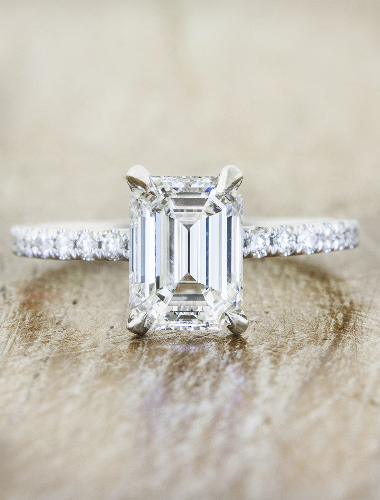 caption:Shown with 1.60ct emerald cut diamond in platinum