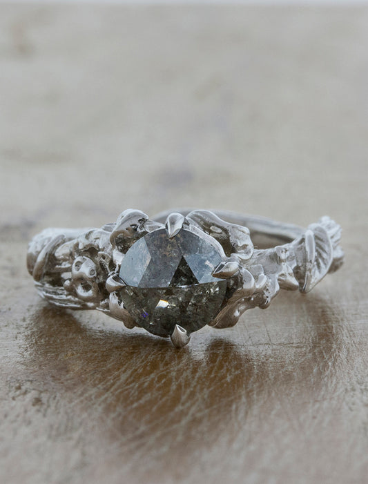 caption:Shown with a rose cut grey diamond in platinum