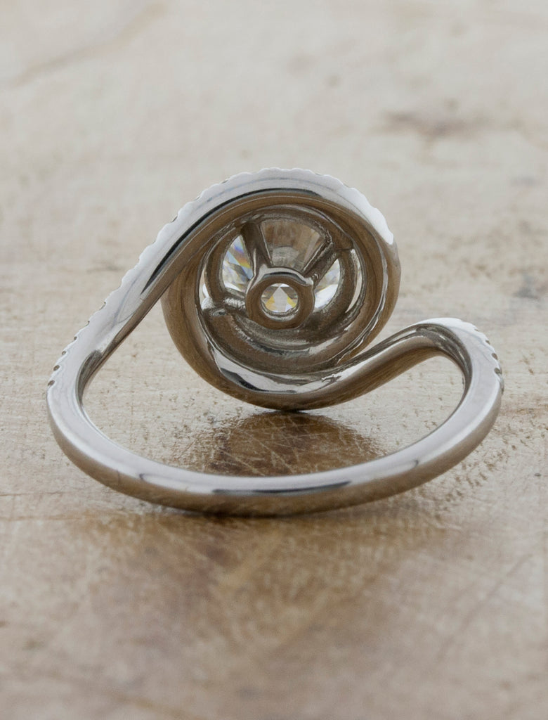 swirling halo diamond engagement ring