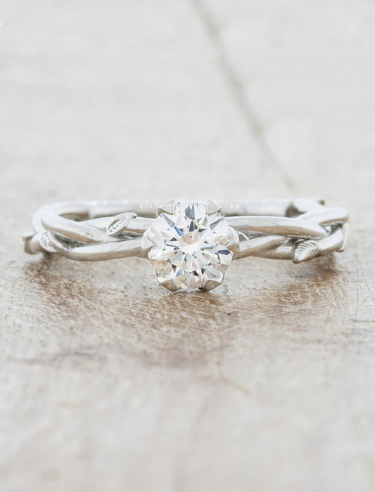 caption:Shown with 0.50ct round diamond in platinum