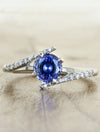caption:Customized with round blue sapphire in platinum