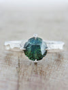 caption:Shown with Medicine Wheel cut Montana Sapphire in platinum with custom texture 
