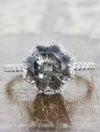 caption:Shown with star cut grey diamond in platinum