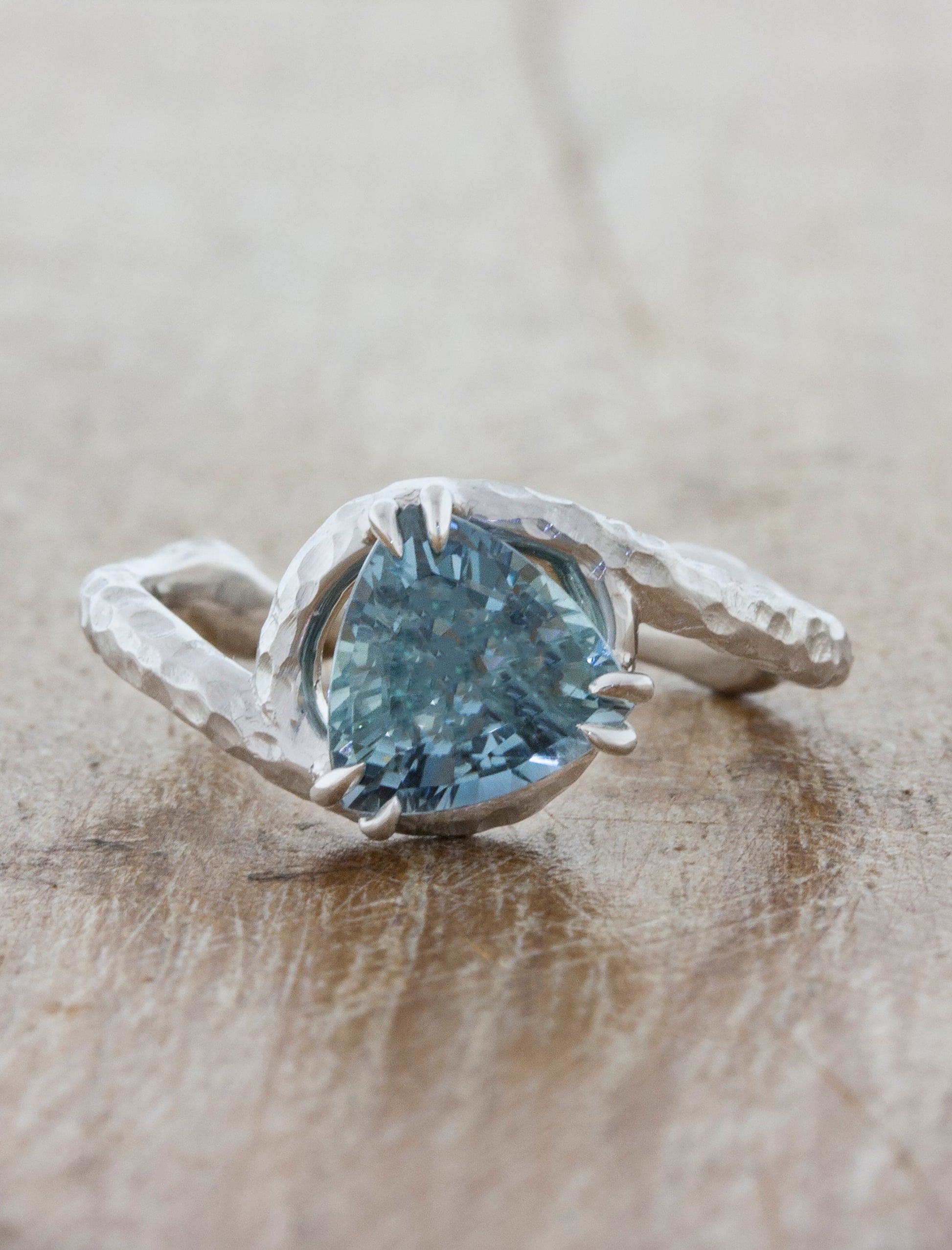 organic inspired raw diamond ring, asymmetrical band caption:1.25ct. Sapphire Trilliant 14k White Gold