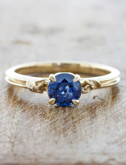 round blue sapphire engagement ring in double band