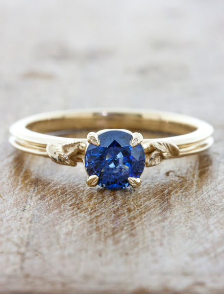 round blue sapphire engagement ring in double band