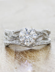 caption:Shown with a 1.4ct round diamond