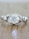 caption:Shown with round diamond in platinum