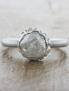 caption:Shown with 3.15ct rough cut diamond in platinum
