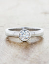 caption:Shown with 0.7ct round diamond in platinum