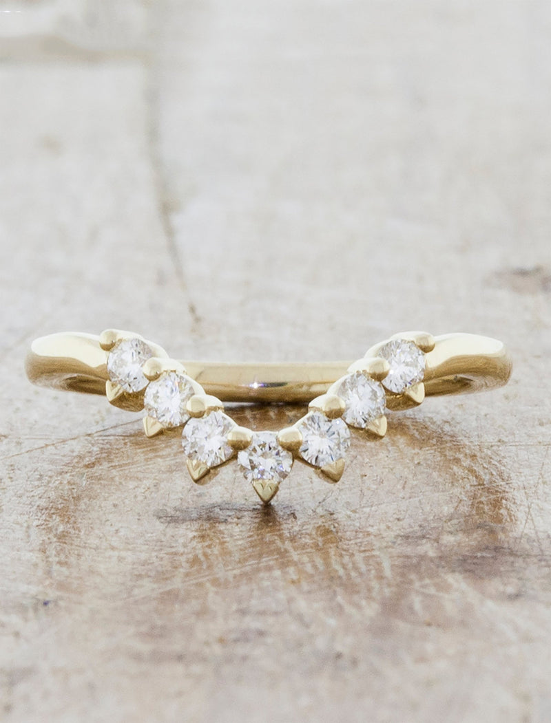 caption:Shown in custom curve with extra diamonds in 14k yellow gold
