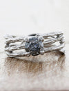 caption:Customized with round grey diamond in platinum