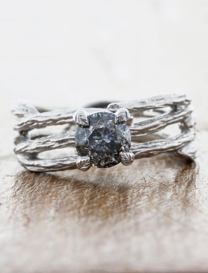 caption:Customized with round grey diamond in platinum
