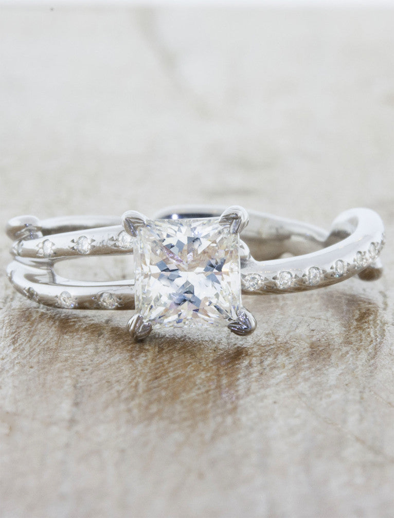 caption:Customized with 1ct princess cut diamond in platinum