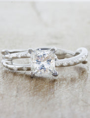 Nature inspired engagement ring leaf prongs. caption:Customized with an 1.00ct. Princess Cut Diamond Platinum