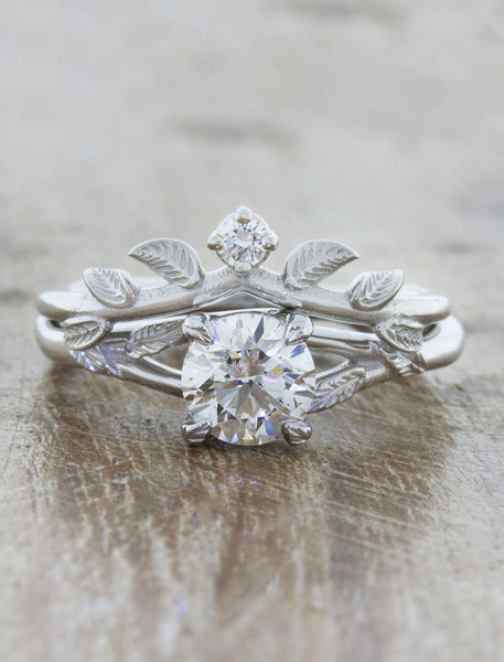 Nature inspired engagement ring;caption:0.70ct. Round Diamond Platinum paired with Adelixa wedding band