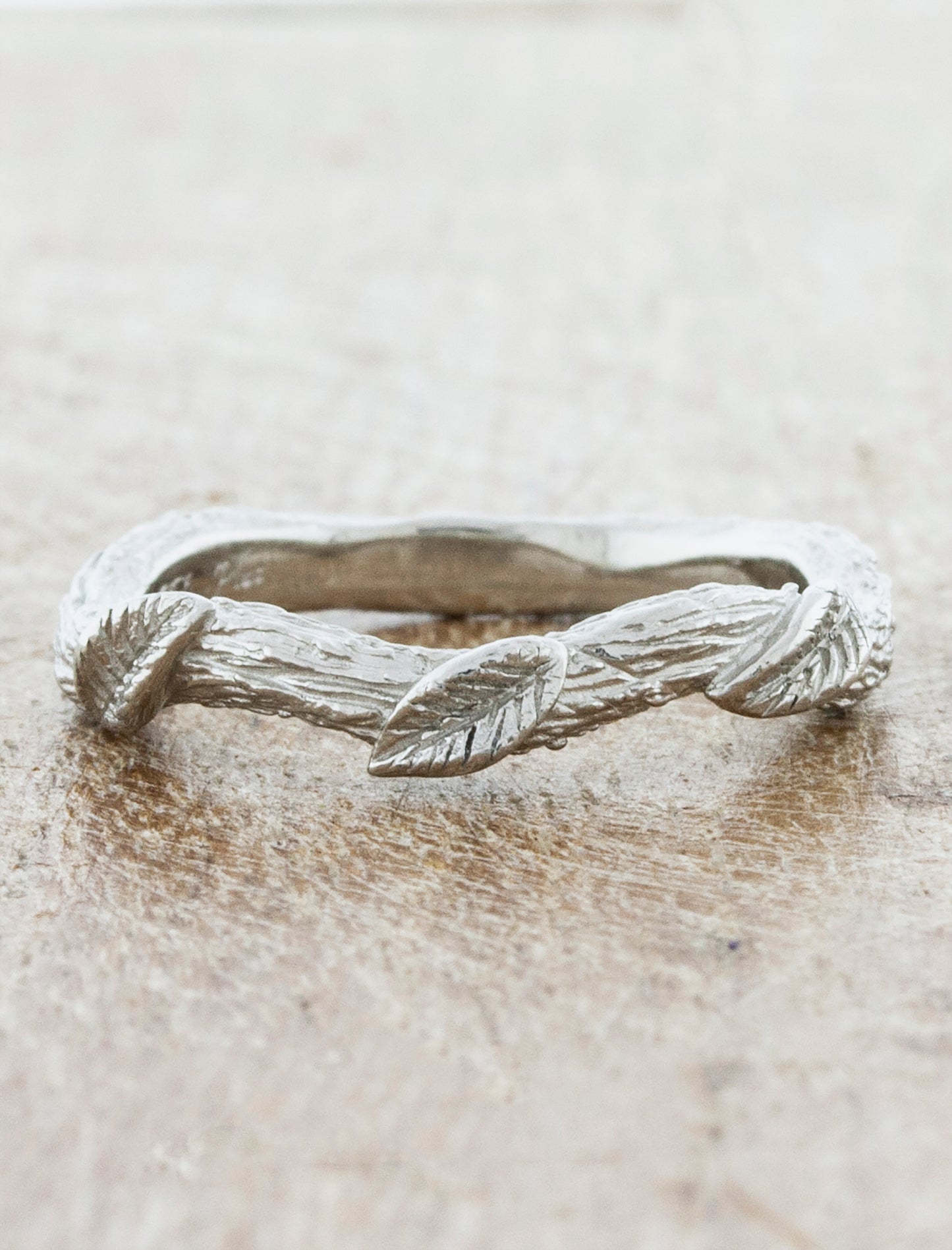 Nature inspired leaf detail wedding ring 