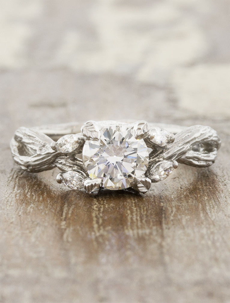 caption:Shown in platinum with 0.75ct round diamond