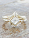 caption:Stacked with Kia wedding band in 14k yellow gold
