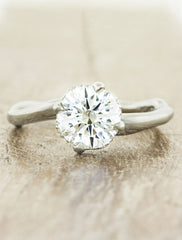 organic shaped band diamond solitaire engagement ring;caption:1.25ct. Round Diamond Platinum