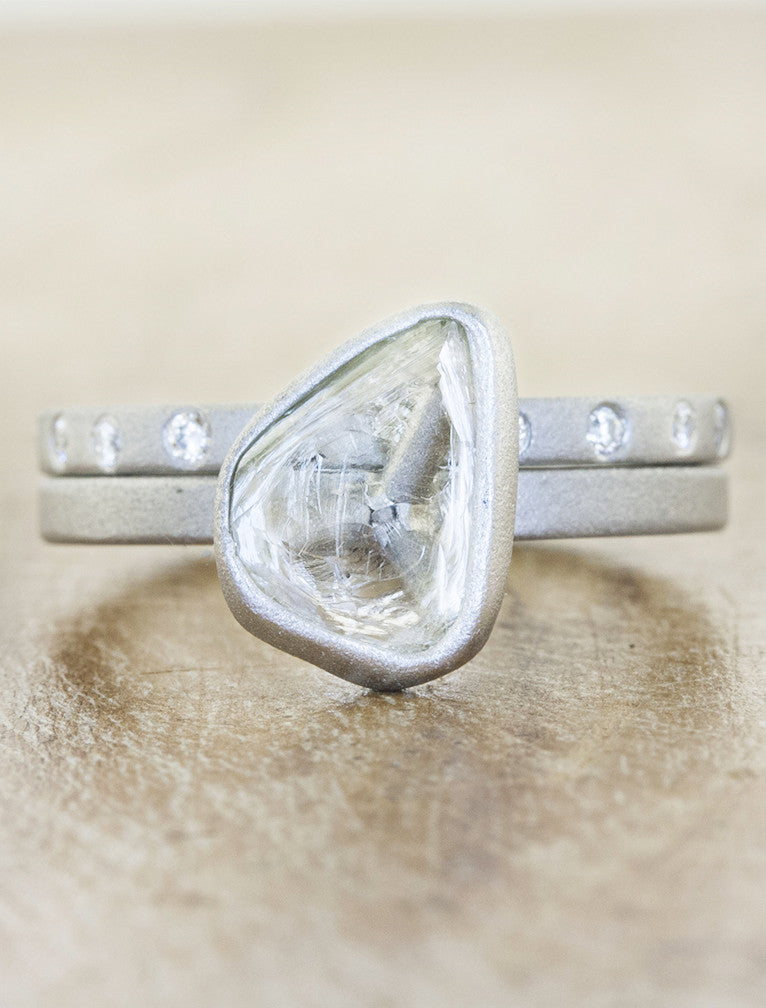 caption:Stacked with custom Krutz wedding band in platinum
