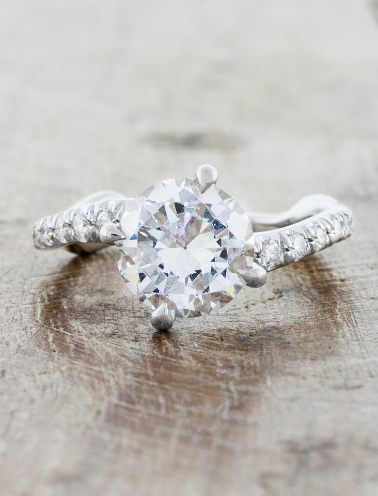 Nature inspired solitaire pave engagement ring;caption:1.75ct. Round Diamond Platinum