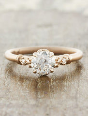 feminine european cut diamond ring in rose gold. caption:Shown in rose gold, with 0.60ct round diamond
