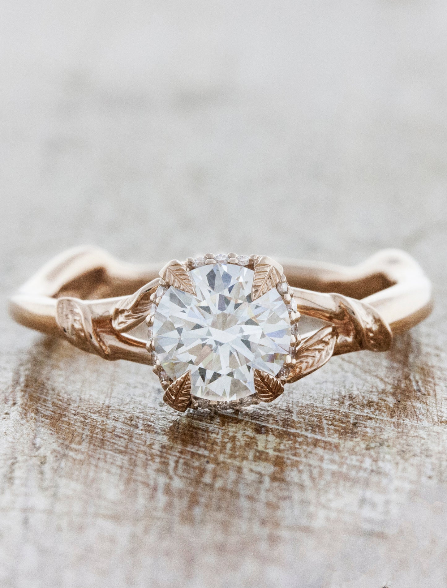 leaf band 4-prong diamond solitaire engagement ring. caption:Shown with 0.70ct diamond option in 14k rose gold