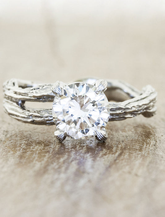 caption:Shown with 1.10ct round diamond in platinum