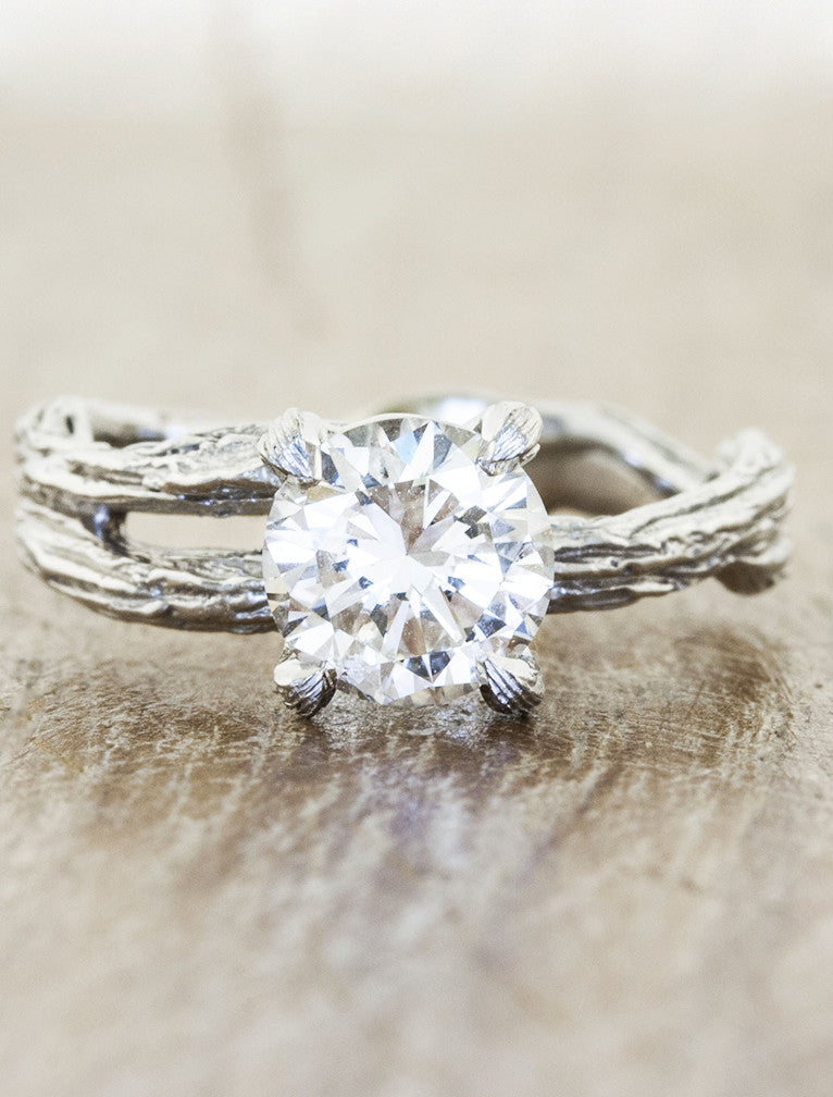 caption:Shown with 1.10ct round diamond in platinum