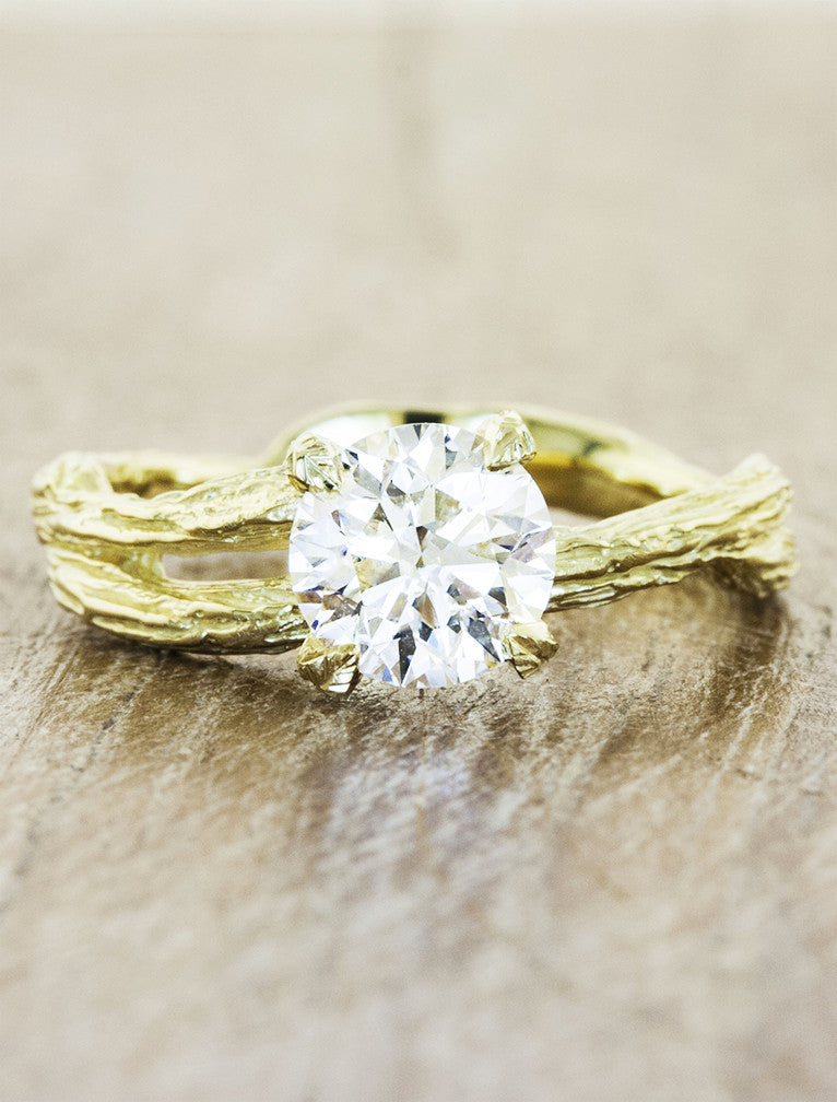 caption:Shown with 1.00ct round diamond in 18k yellow gold