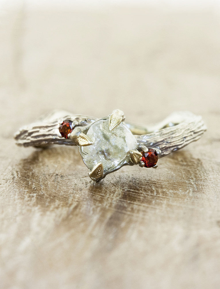 caption:Shown with rough cut diamond & ruby accent stones in mixed yellow gold & platinum