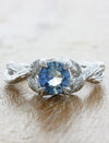 caption:Shown with round blue sapphire in platinum