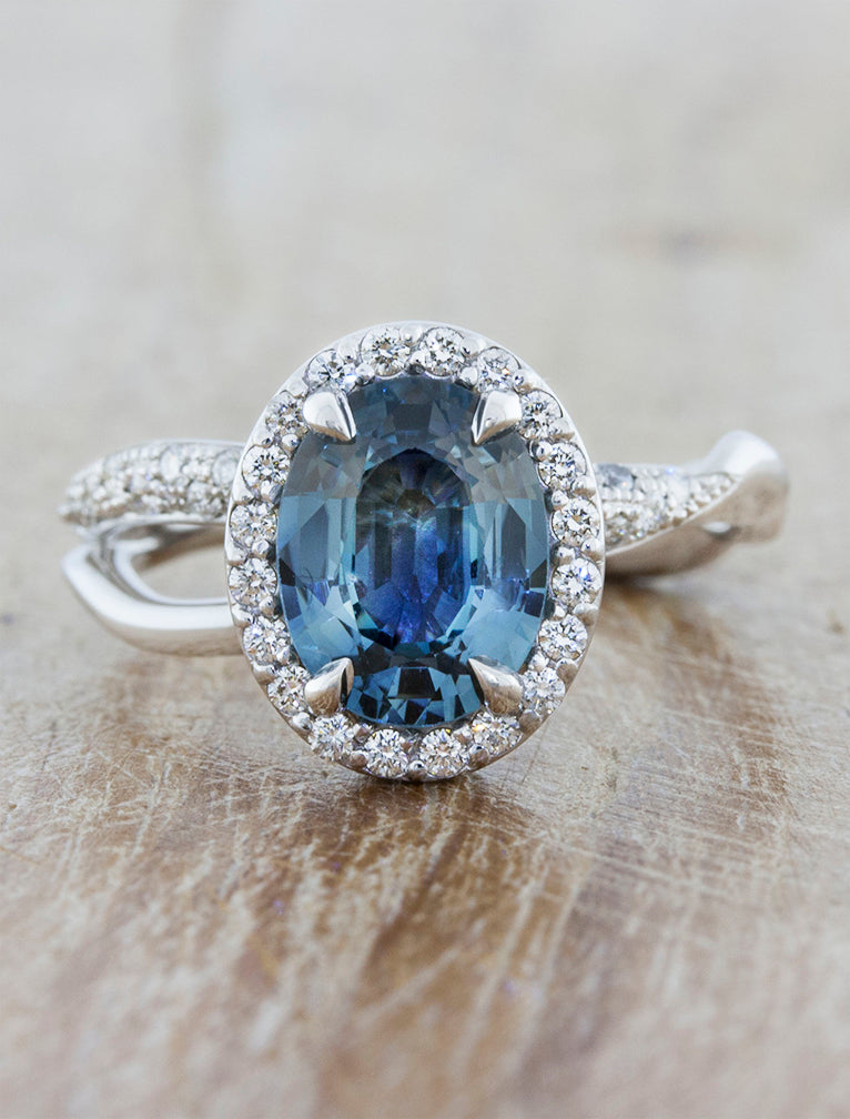 caption:Shown with oval blue sapphire in 14k white gold