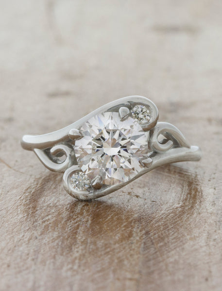 swirling diamond engagement ring