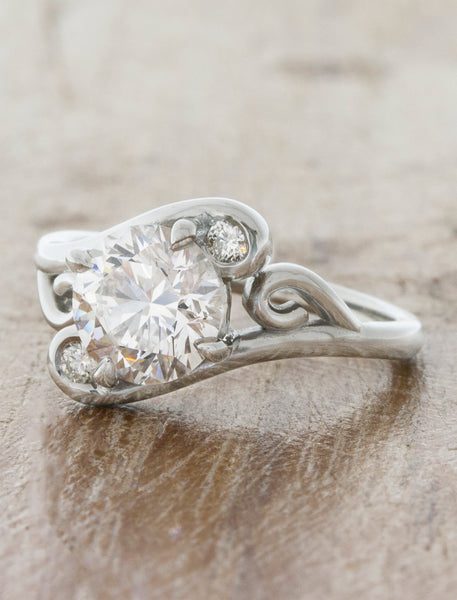 swirling diamond engagement ring with split band